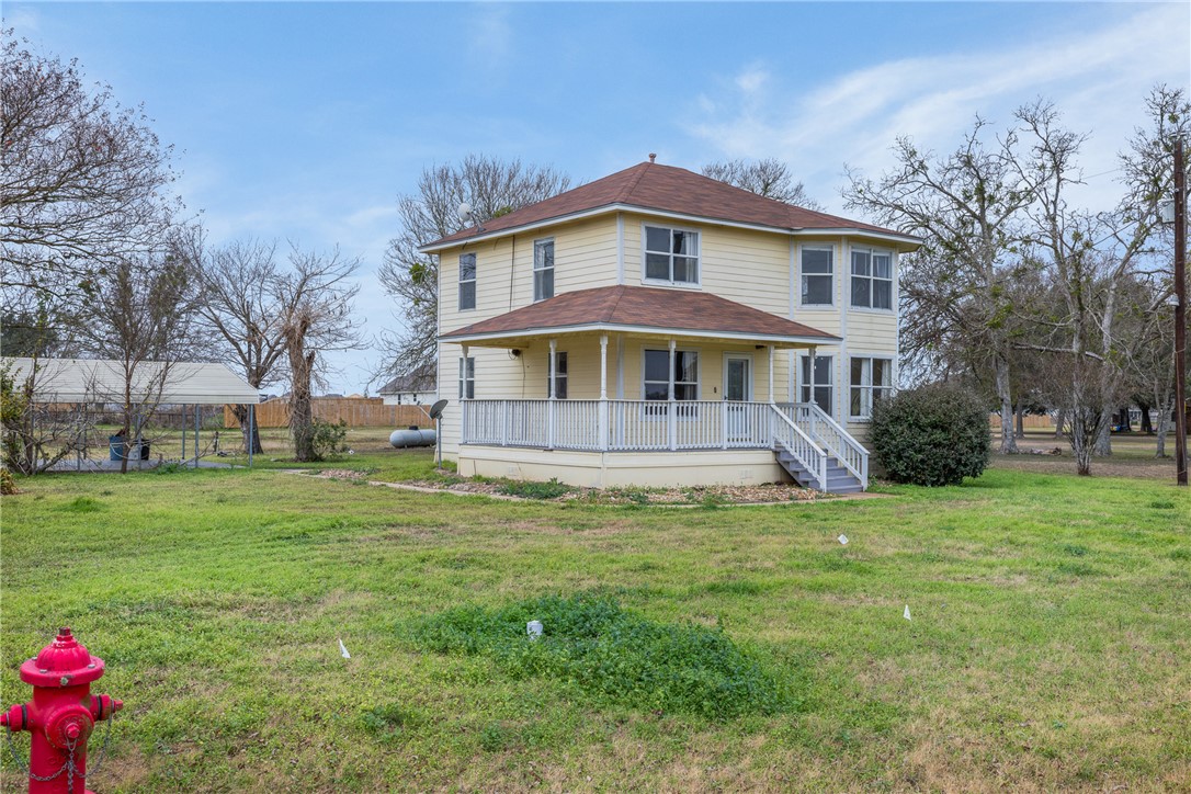 1172 County Road 268 Somerville, TX 77879 - Photo 3 of 40 a view of a house with a yard table and chairs