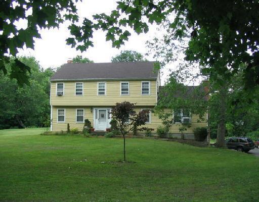 a house view with a garden space