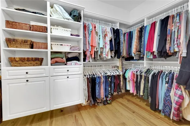 a living room with furniture window and a flat screen tv