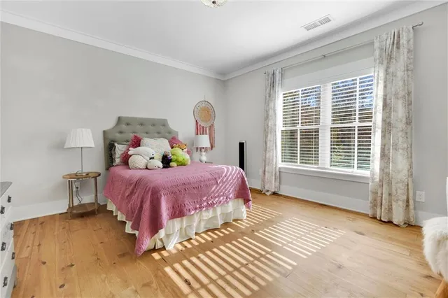 a kitchen with stainless steel appliances a stove microwave and cabinets