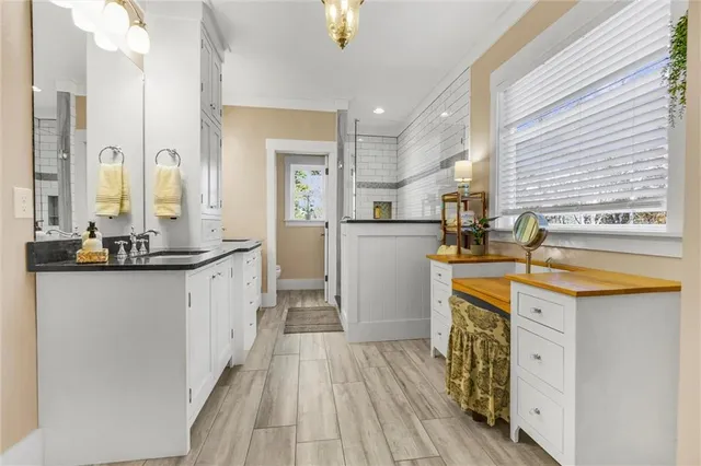 a living room with fireplace furniture and a flat screen tv