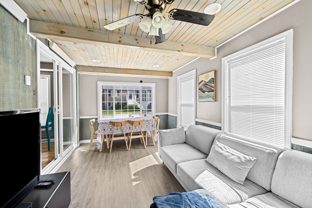 15 Packard Avenue Hull, MA 02045 - Photo 17 of 32 a living room with furniture and a wooden floor