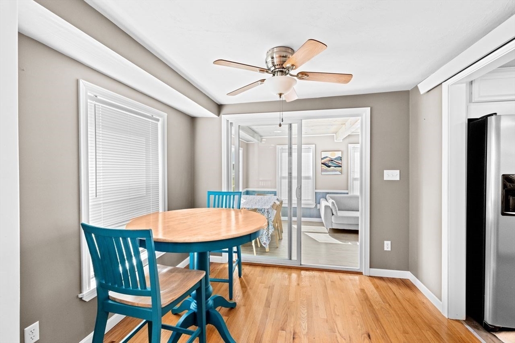 15 Packard Avenue Hull, MA 02045 - Photo 20 of 32 a view of a dining room with furniture window and wooden floor