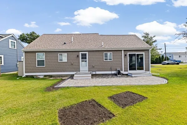 a view of a house with swimming pool and porch