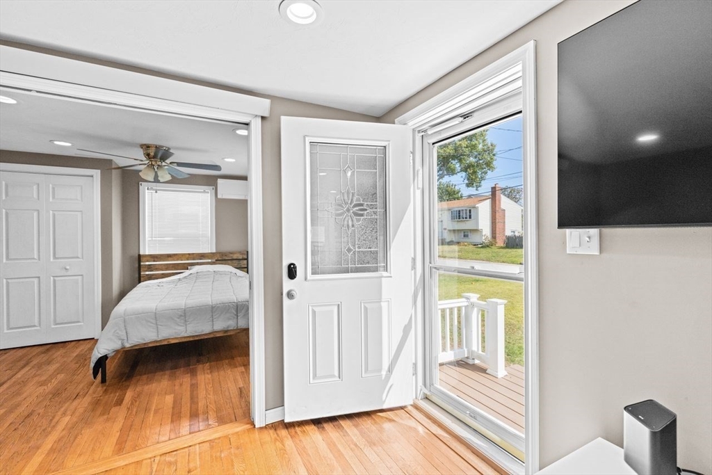 15 Packard Avenue Hull, MA 02045 - Photo 5 of 32 a bedroom with a bed and a window