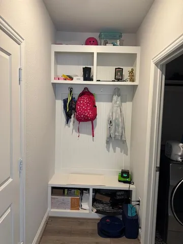 a room with furniture and book shelf