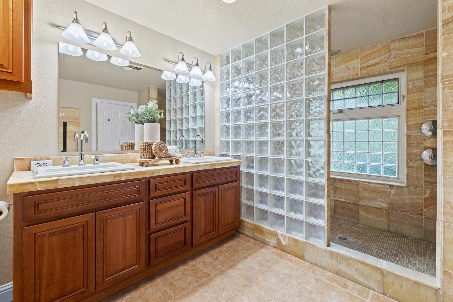 7396 Callison Road Penryn, CA 95663 - Photo 42 of 99 Primary Bath with honey onyx tiling.