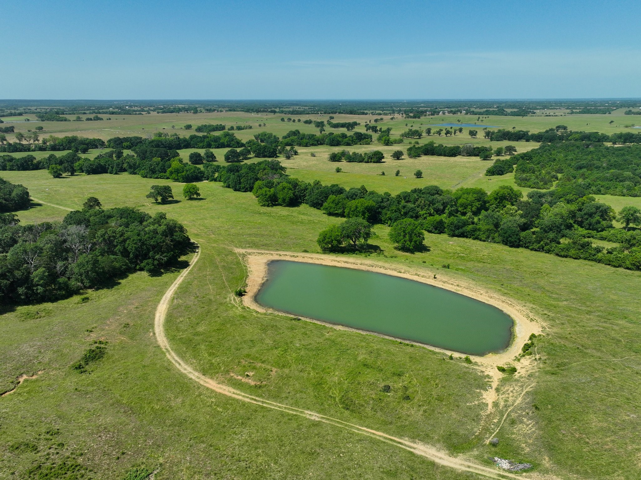 305 Rd Navasota Tx 77868 Road Navasota, TX 77868 - Photo 4 of 22 an aerial view of a houses with a yard