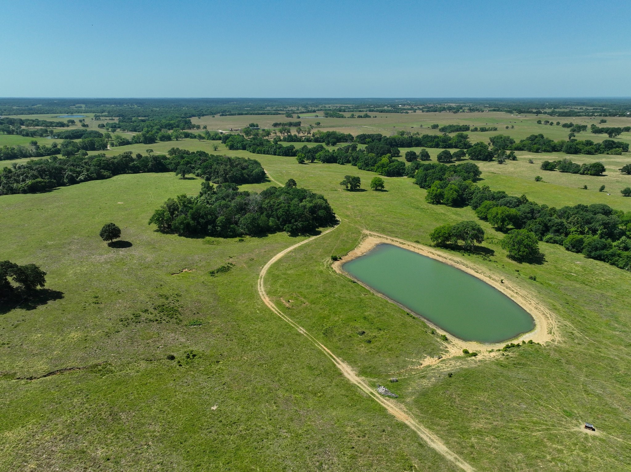305 Rd Navasota Tx 77868 Road Navasota, TX 77868 - Photo 5 of 22 an aerial view of a residential houses with outdoor space and trees