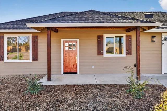 a front view of a house with garage