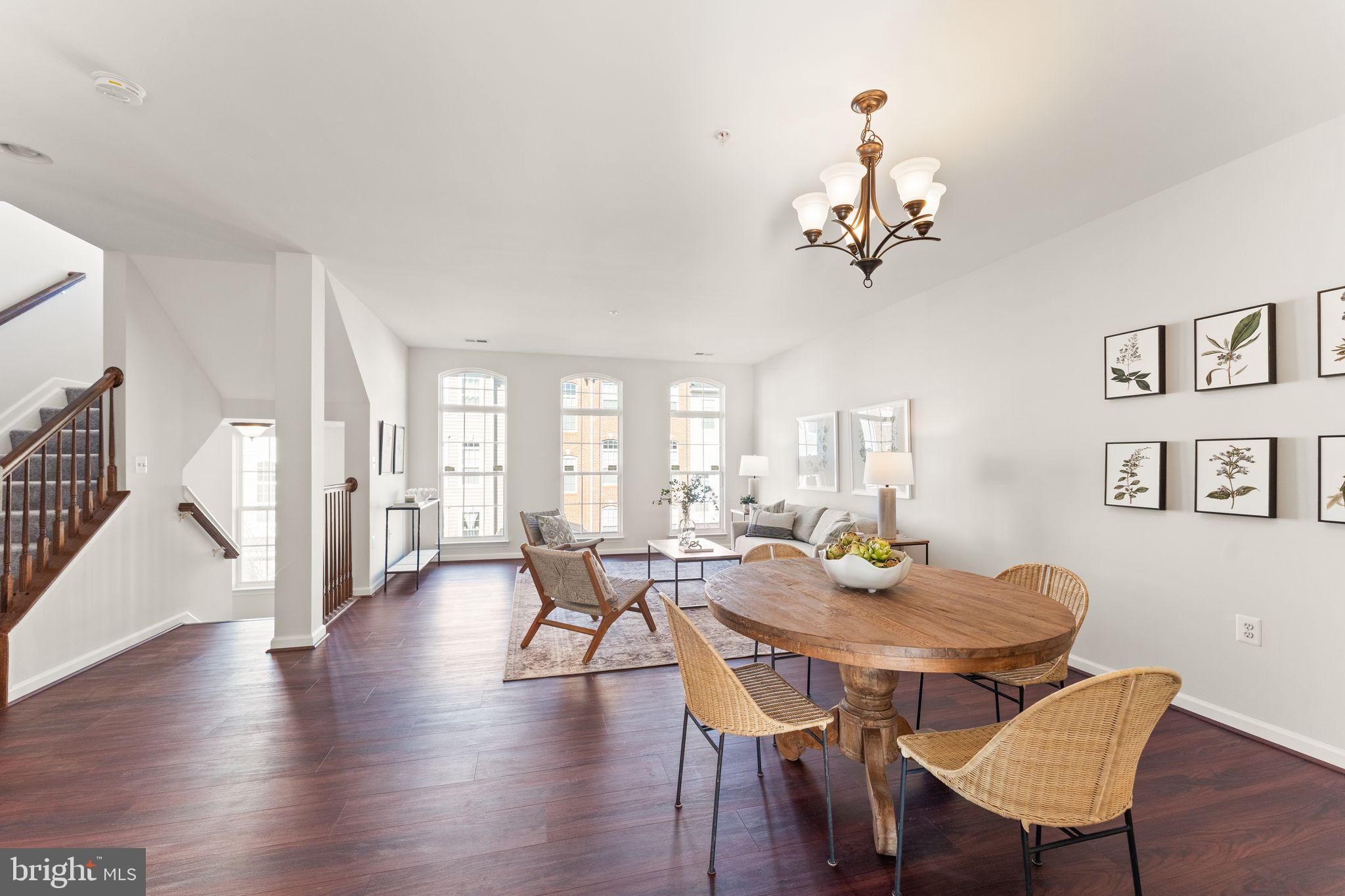6072 Wicker Lane, Unit 160 Centreville, VA 20121 - Photo 14 of 58 a view of a dining room with furniture window and wooden floor
