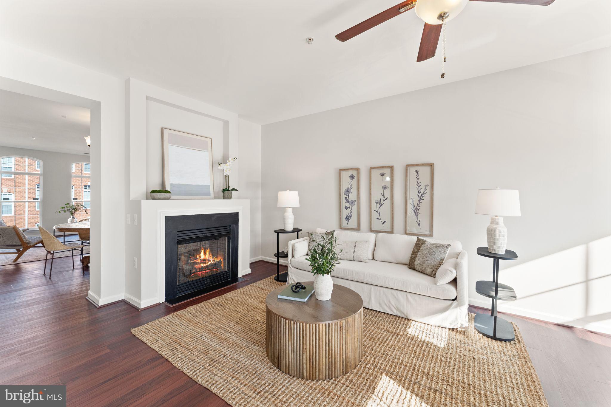 6072 Wicker Lane, Unit 160 Centreville, VA 20121 - Photo 17 of 58 a living room with furniture and a fireplace