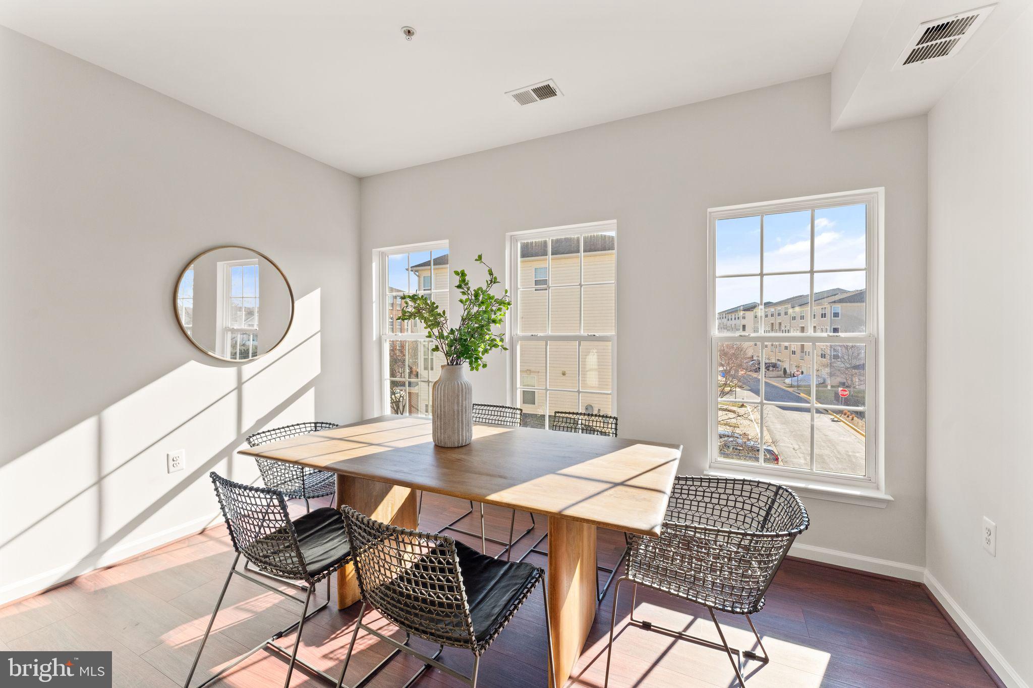 6072 Wicker Lane, Unit 160 Centreville, VA 20121 - Photo 19 of 58 a dining room with furniture and window