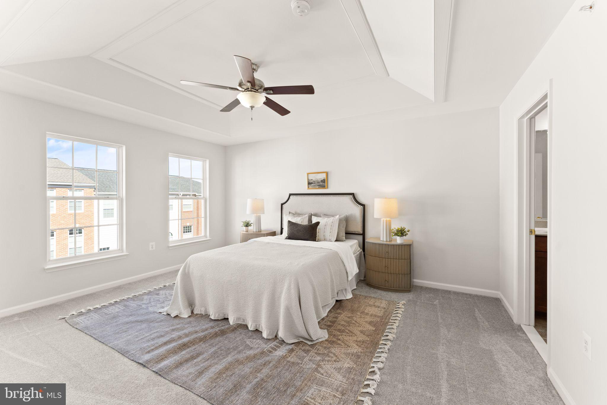 6072 Wicker Lane, Unit 160 Centreville, VA 20121 - Photo 31 of 58 a bedroom with a bed and window