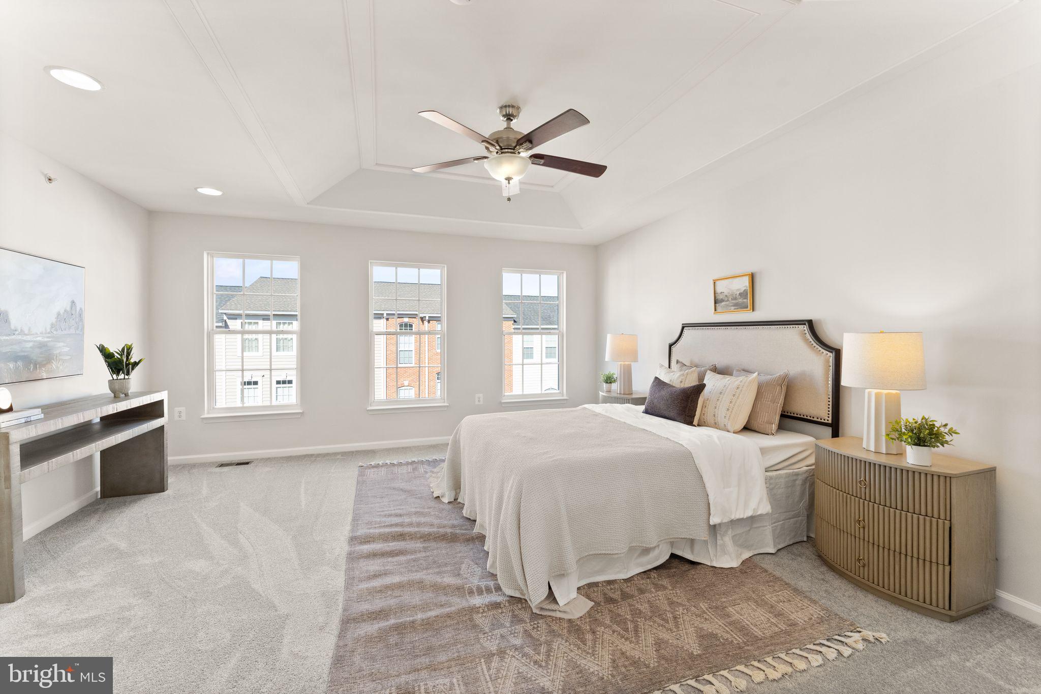 6072 Wicker Lane, Unit 160 Centreville, VA 20121 - Photo 35 of 58 a bedroom with a large bed and a window