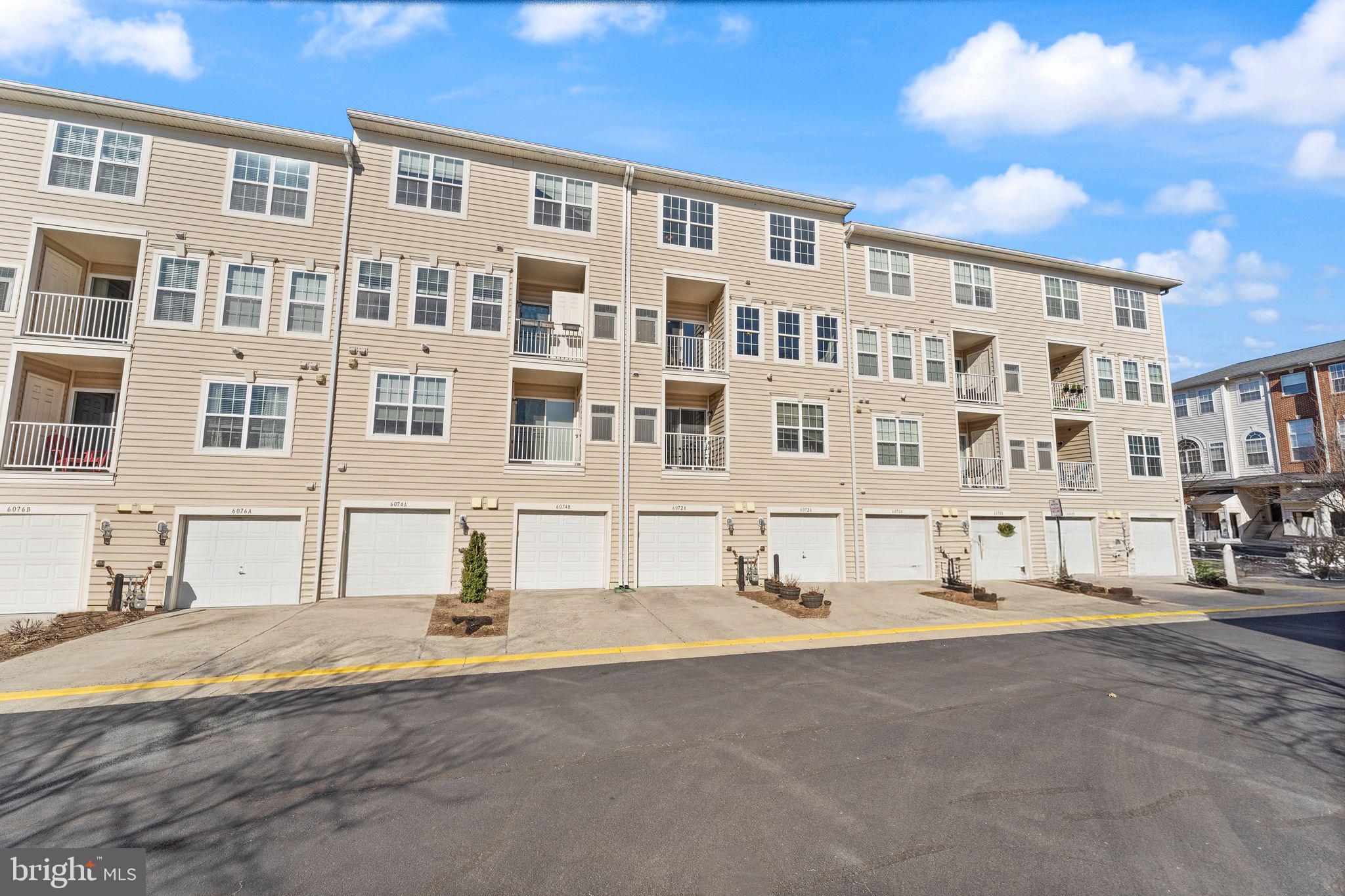 6072 Wicker Lane, Unit 160 Centreville, VA 20121 - Photo 47 of 58 a view of building with a street