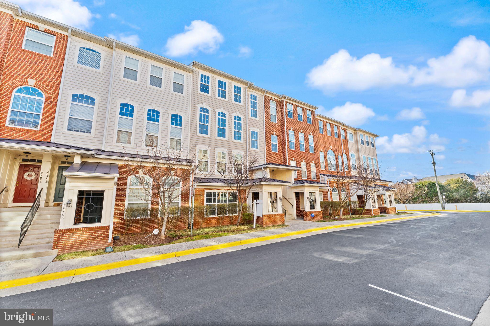 6072 Wicker Lane, Unit 160 Centreville, VA 20121 - Photo 5 of 58 a view of building with swimming pool in front of it