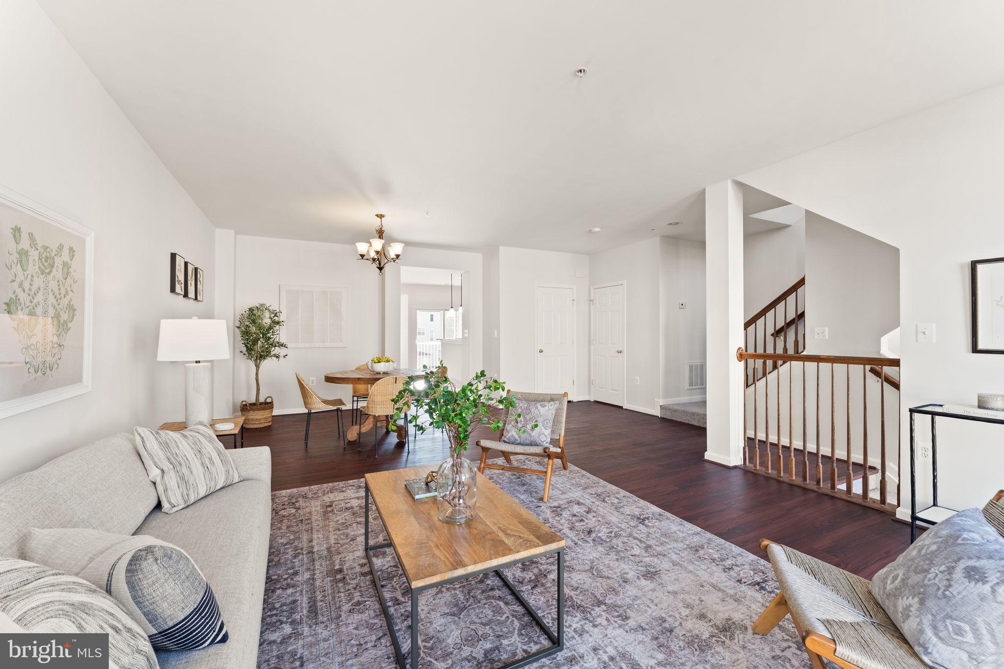 6072 Wicker Lane, Unit 160 Centreville, VA 20121 - Photo 7 of 58 a living room with furniture potted plant and wooden floor