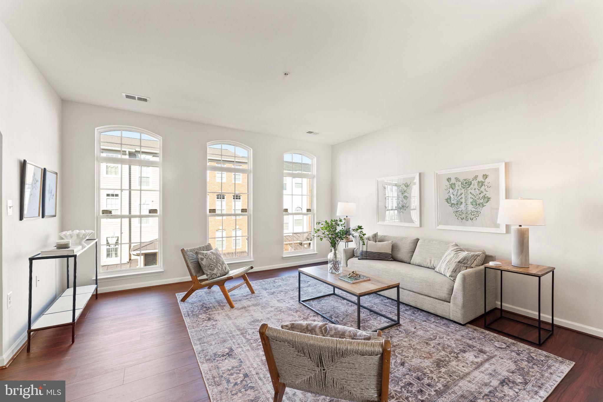 6072 Wicker Lane, Unit 160 Centreville, VA 20121 - Photo 9 of 58 a living room with furniture and a wooden floor