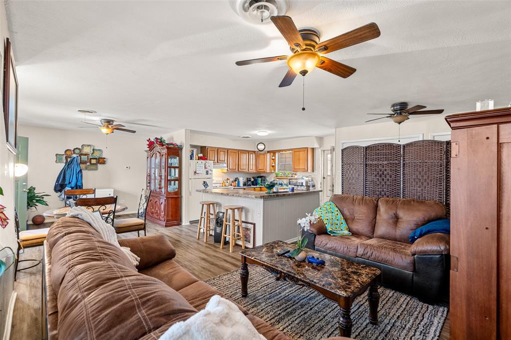 1809 Beverly Street Irving, TX 75061 - Photo 21 of 24 a living room with furniture and kitchen view