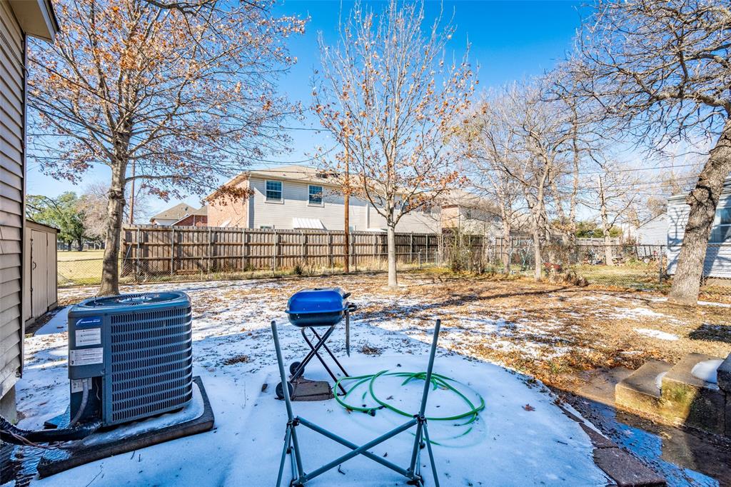 1809 Beverly Street Irving, TX 75061 - Photo 10 of 24 a view of a chairs and table on the wooden floor