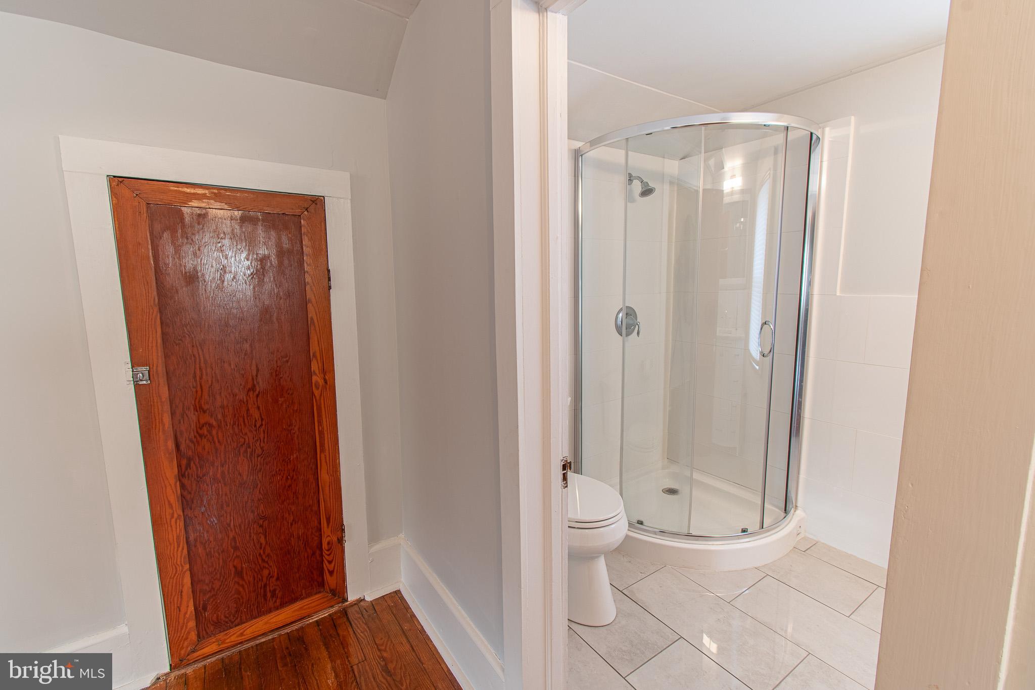 207 Crusader Road Cambridge, MD 21613 - Photo 58 of 76 a bathroom with a shower toilet and sink