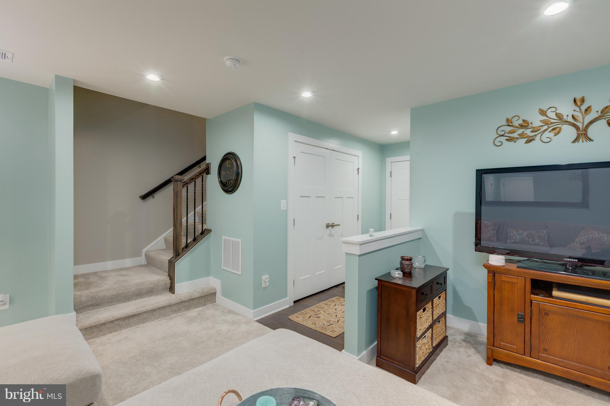 18008 Red Cedar Road Dumfries, VA 22026 - Photo 26 of 28 Lower level Family Room has storage area