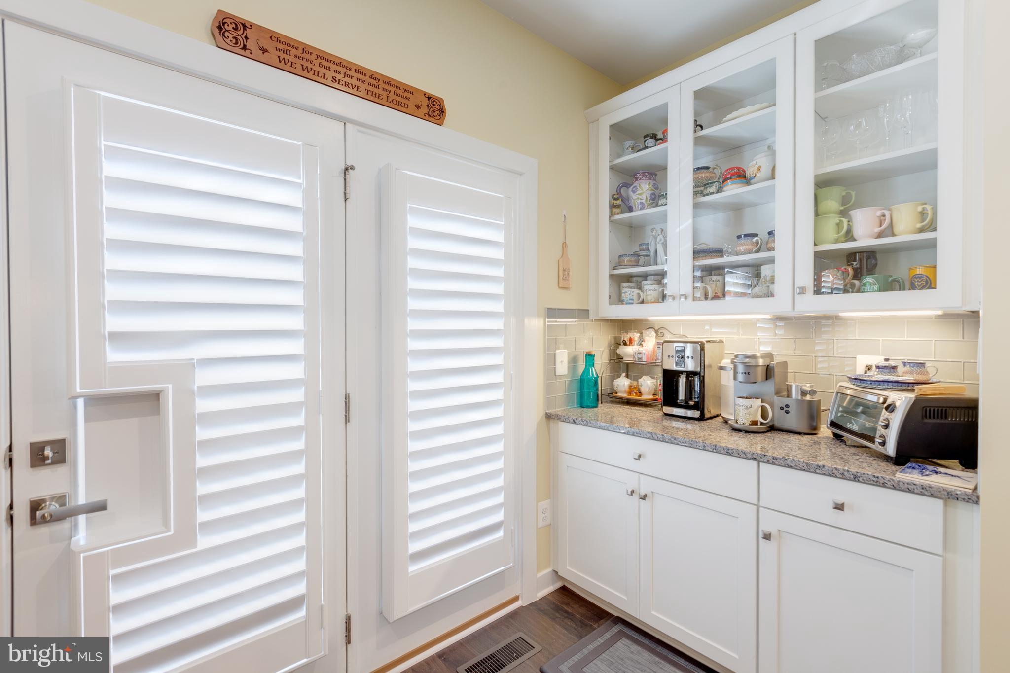 18008 Red Cedar Road Dumfries, VA 22026 - Photo 8 of 28 Kitchen with Custom Built in Hutch opens to Deck