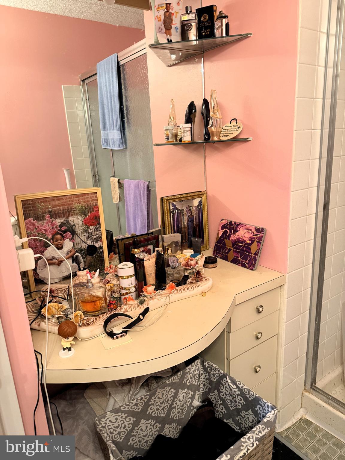 860 Lower Ferry Road, Unit 4C Ewing, NJ 08628 - Photo 16 of 27 a bathroom with a sink and a mirror
