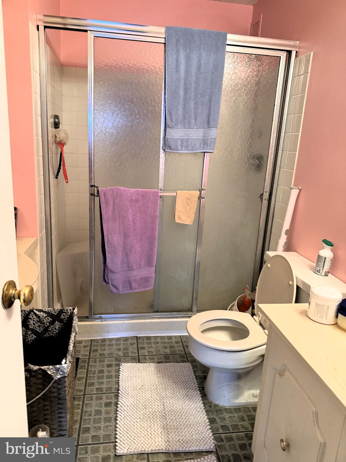 860 Lower Ferry Road, Unit 4C Ewing, NJ 08628 - Photo 17 of 27 a bathroom with a toilet and a shower