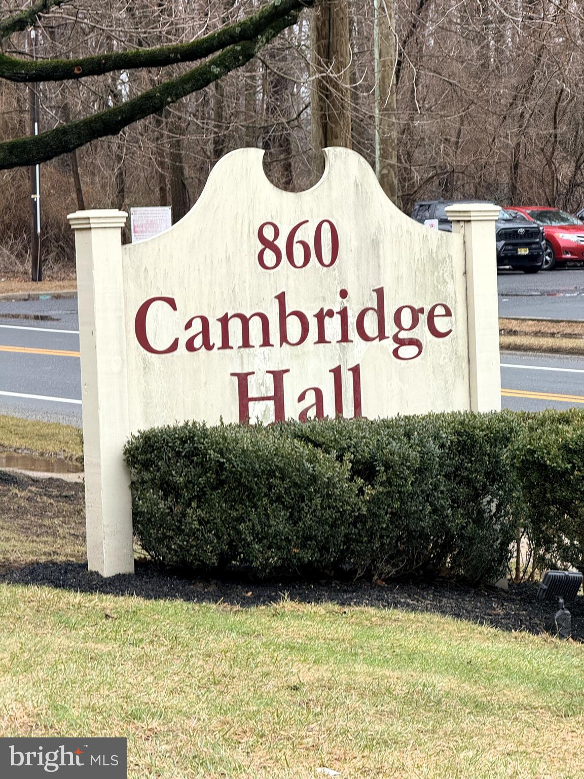 860 Lower Ferry Road, Unit 4C Ewing, NJ 08628 - Photo 2 of 27 a street sign that is on a brick wall