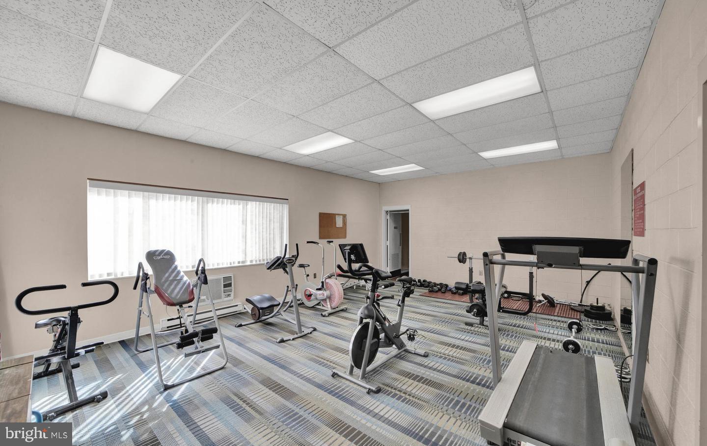 860 Lower Ferry Road, Unit 4C Ewing, NJ 08628 - Photo 27 of 27 a living room with furniture and a table