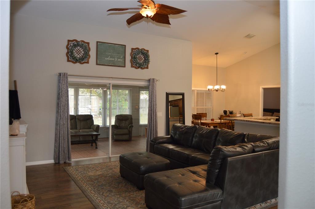 2291 Danforth Road Spring Hill, FL 34608 - Photo 14 of 57 a living room with furniture and a window