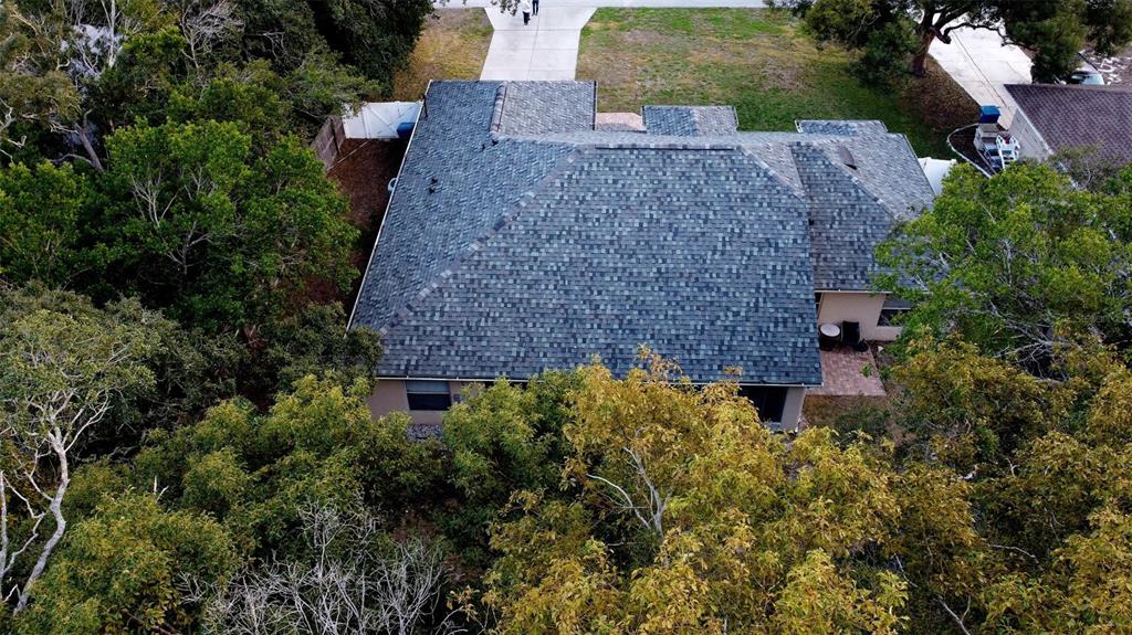 2291 Danforth Road Spring Hill, FL 34608 - Photo 57 of 57 an aerial view of a house with a yard