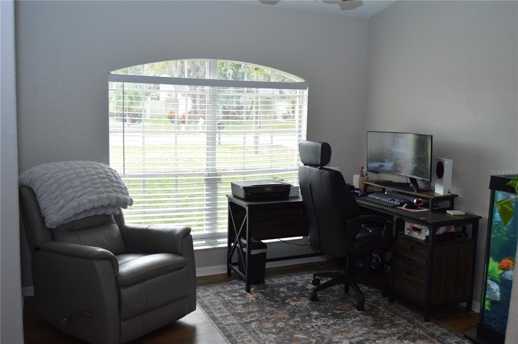 2291 Danforth Road Spring Hill, FL 34608 - Photo 10 of 57 a view of a livingroom with workspace and a window