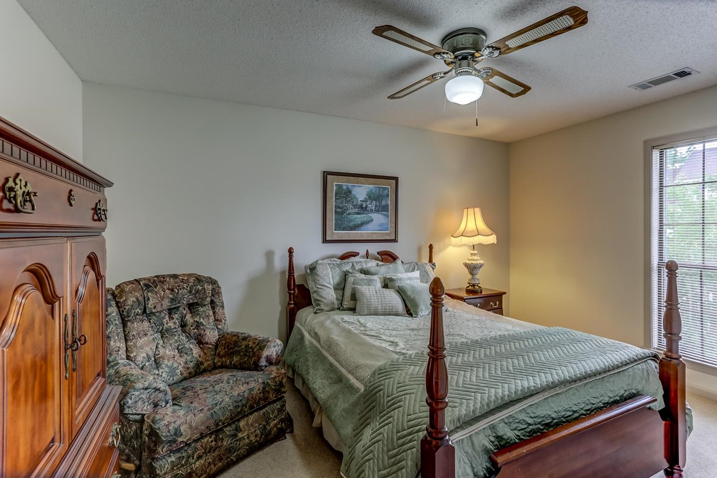 6552 Stephan Ridge Cove Bartlett, TN 38135 - Photo 19 of 24 a bed room with furniture and a chandelier