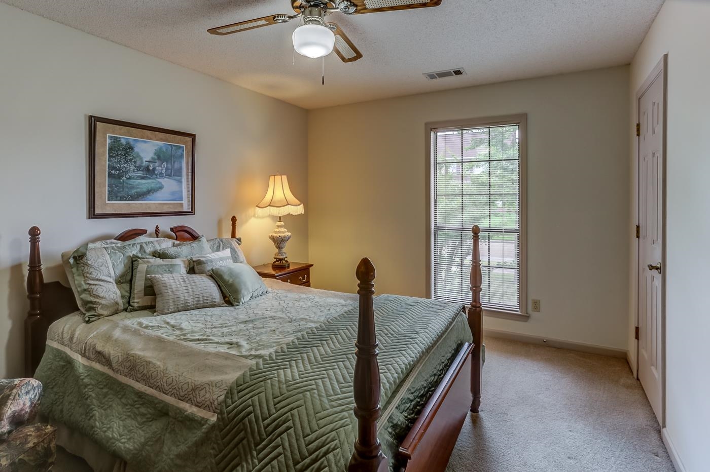 6552 Stephan Ridge Cove Bartlett, TN 38135 - Photo 20 of 24 a bedroom with a bed and a window