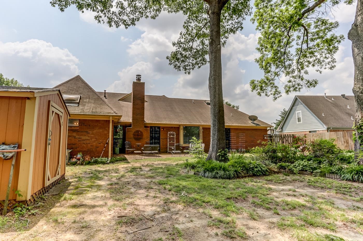 6552 Stephan Ridge Cove Bartlett, TN 38135 - Photo 23 of 24 a front view of a house with a yard and garage