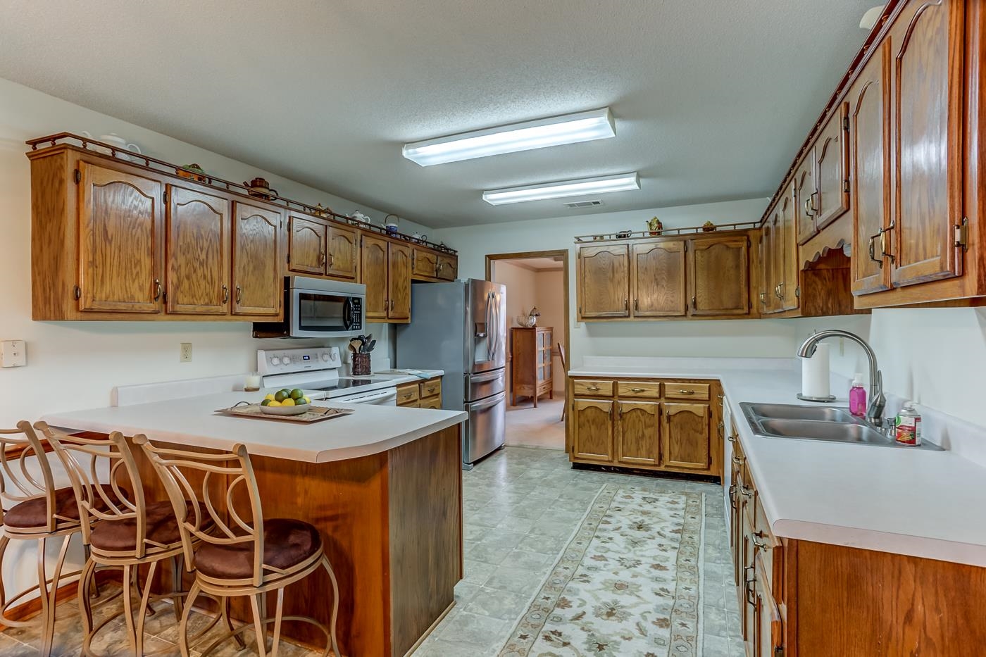 6552 Stephan Ridge Cove Bartlett, TN 38135 - Photo 7 of 24 a kitchen with stainless steel appliances kitchen island granite countertop a sink and cabinets
