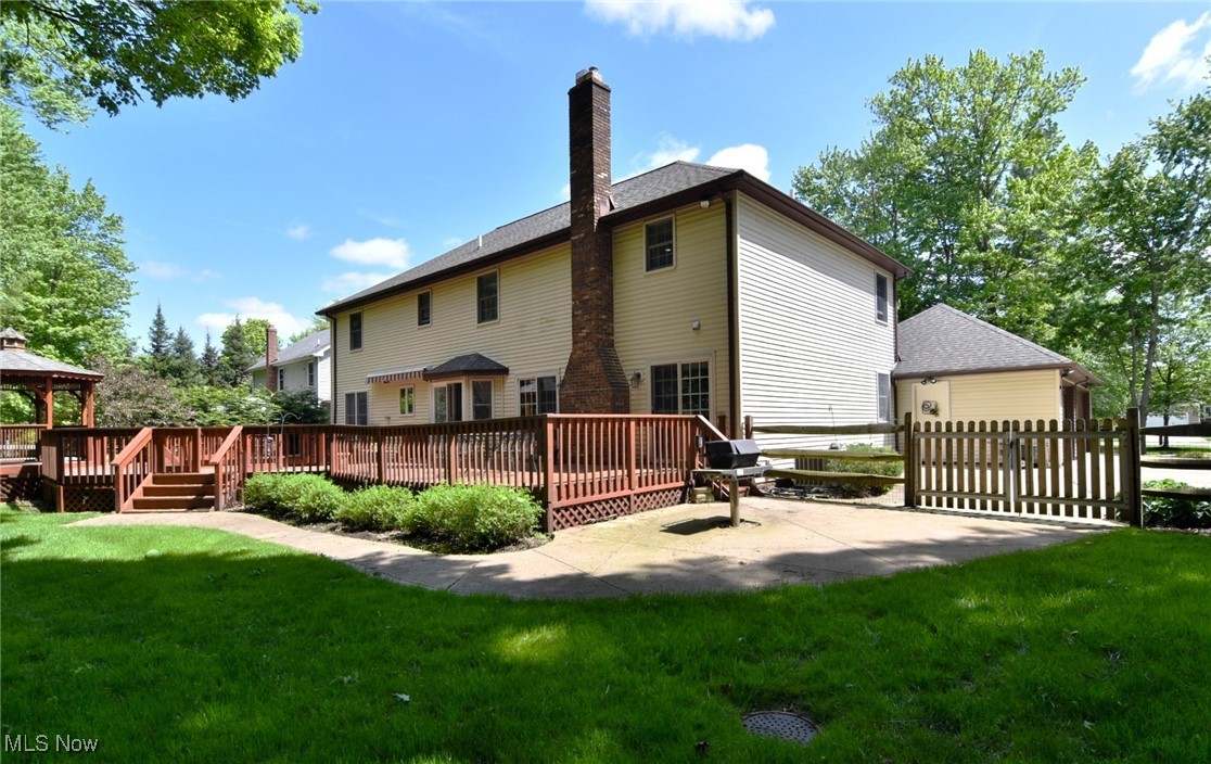 5510 Som Center Road Solon, OH 44139 - Photo 35 of 38 Rear view of house with a gazebo, a chimney, and a deck