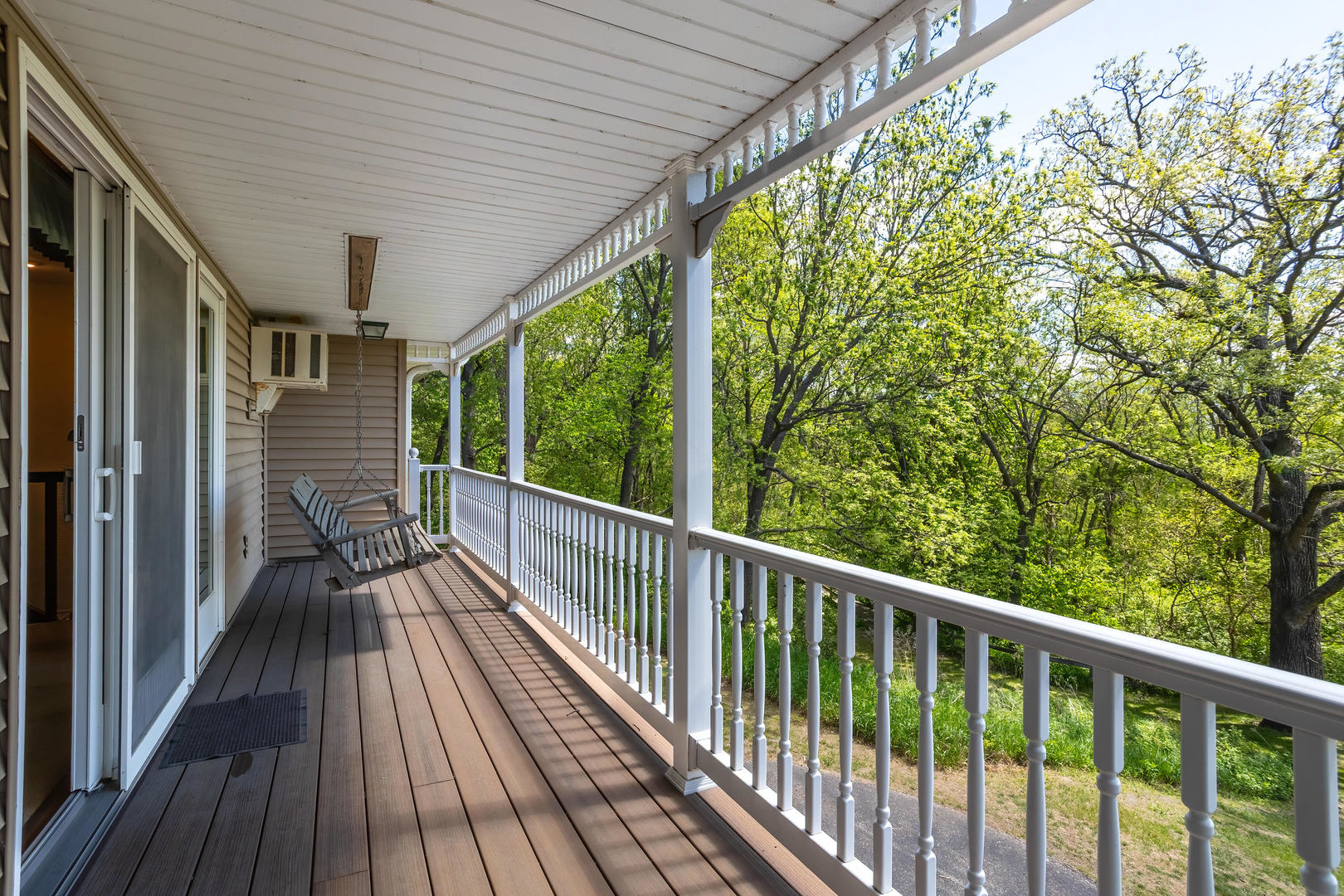 2660 252nd Street De Witt, IA 52742 - Photo 4 of 45 a view of balcony with wooden floor