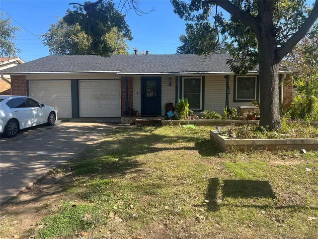 a swimming pool with outdoor seating and yard