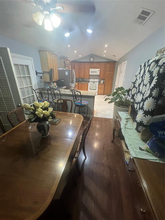 3424 Cardinal Lane Irving, TX 75062 - Photo 4 of 17 a view of a living room and dining room