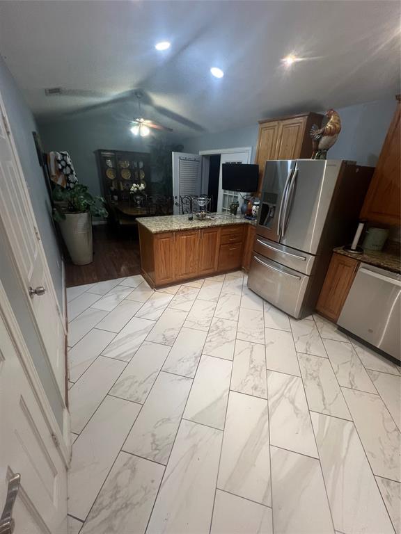 3424 Cardinal Lane Irving, TX 75062 - Photo 5 of 17 a view of kitchen with furniture and a refrigerator