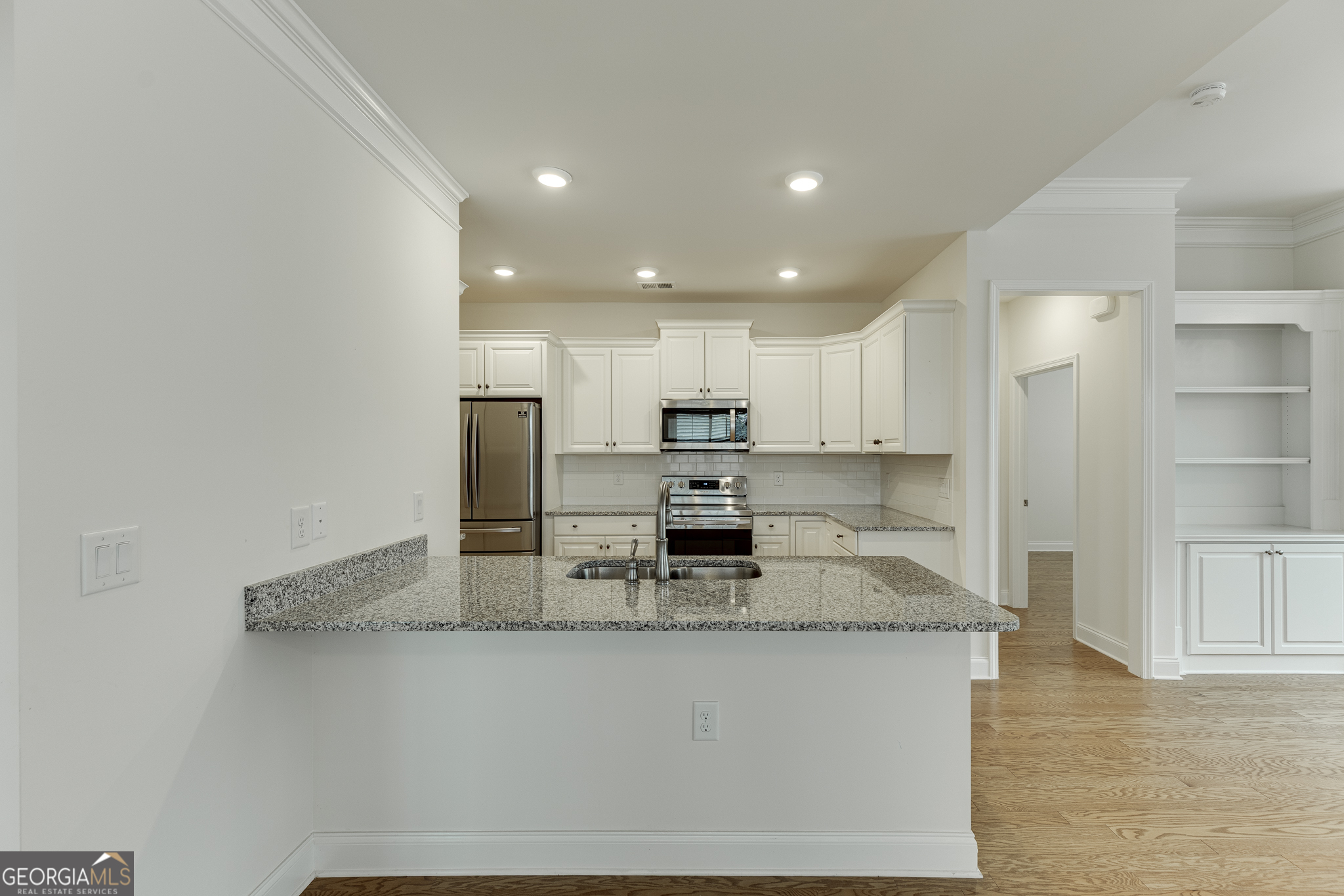 3765 Ridgehurst Drive Buford, GA 30518 - Photo 14 of 44 Kitchen featuring ample prep space and updated finishes.
