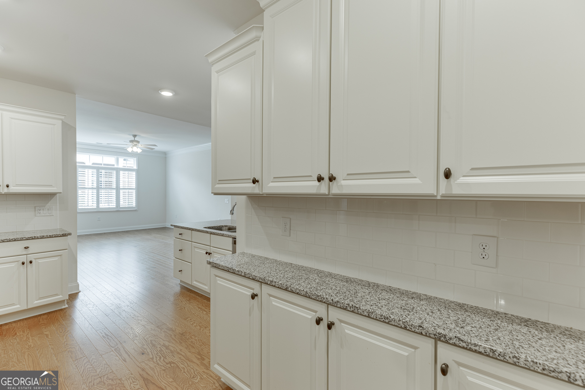 3765 Ridgehurst Drive Buford, GA 30518 - Photo 18 of 44 Long run of kitchen cabinetry offering excellent storage and workspace.