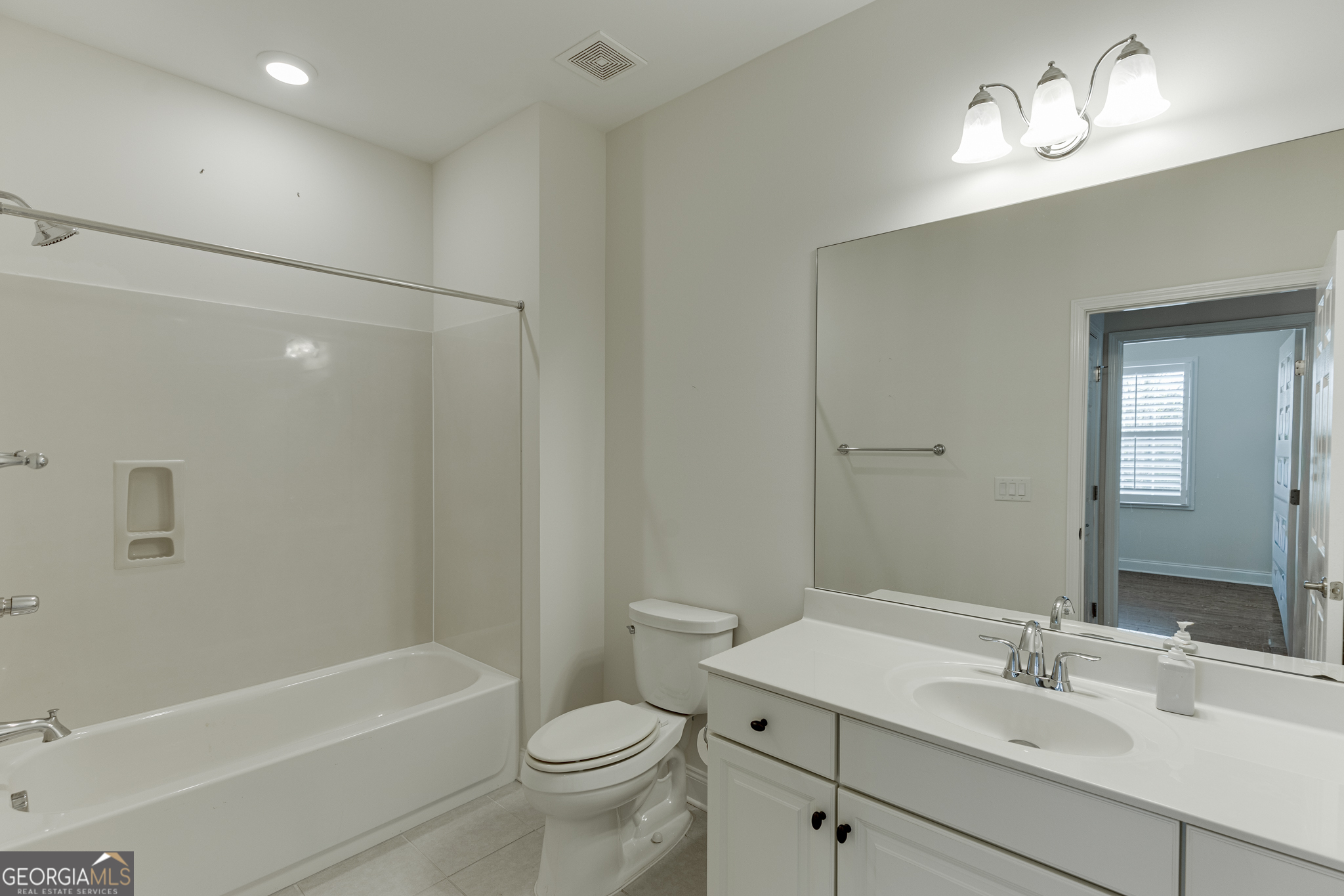 3765 Ridgehurst Drive Buford, GA 30518 - Photo 25 of 44 Full bathroom with updated vanity, soaking tub, and separate shower.