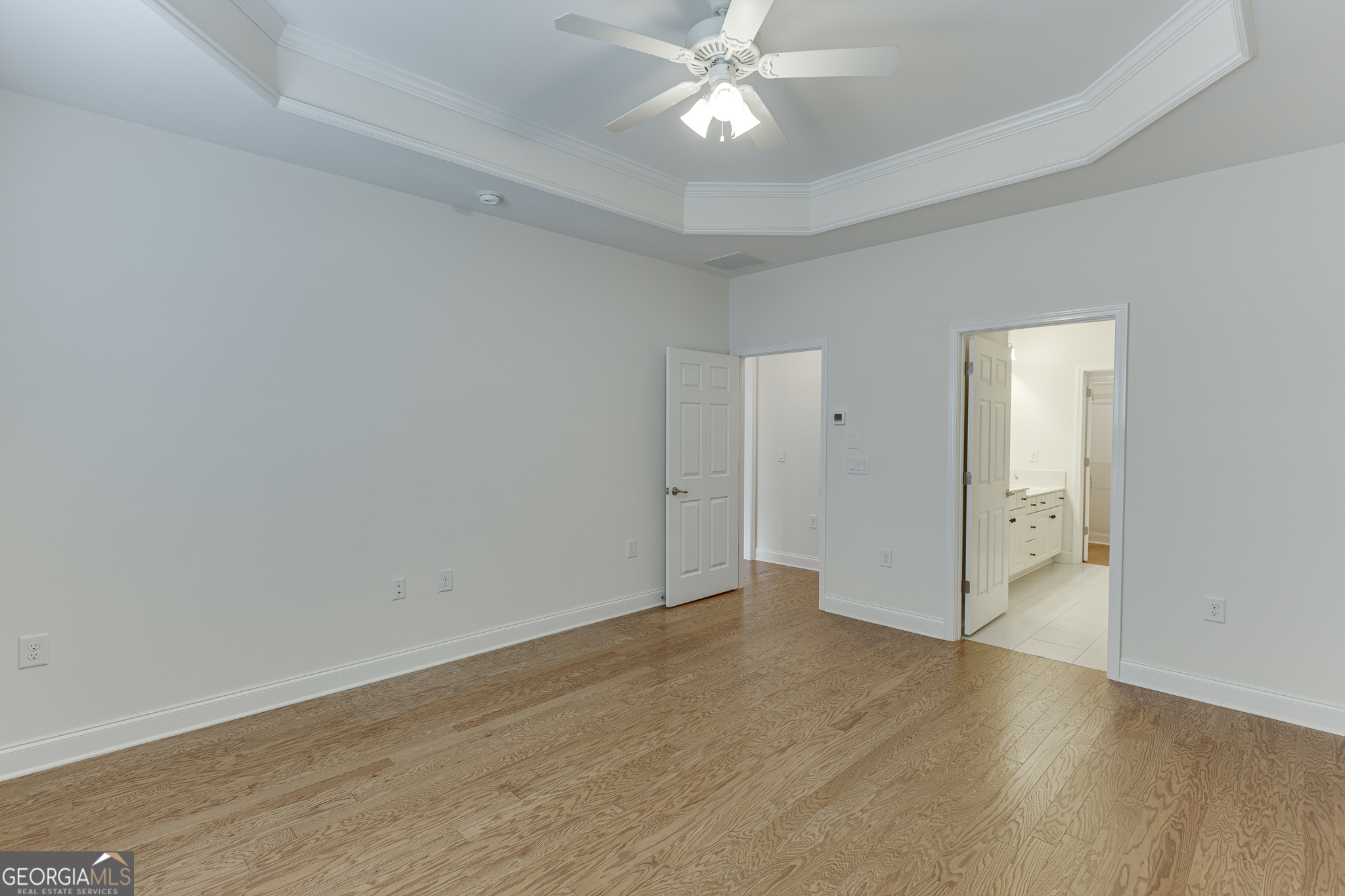 3765 Ridgehurst Drive Buford, GA 30518 - Photo 28 of 44 Primary room showing access to adjoining bath and flexible layout.