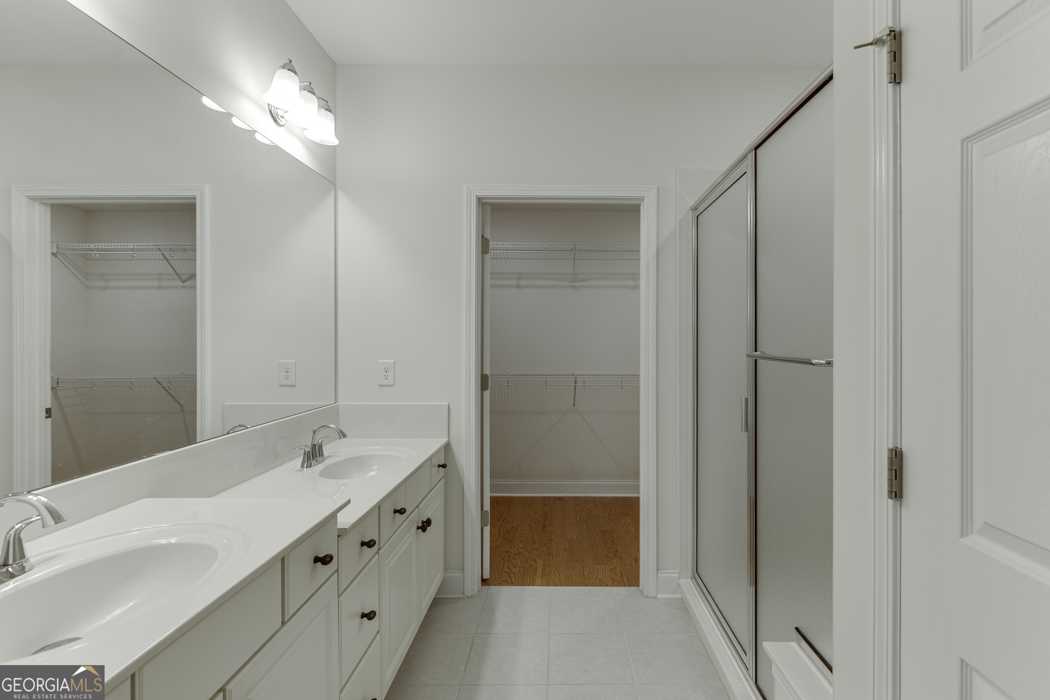 3765 Ridgehurst Drive Buford, GA 30518 - Photo 29 of 44 Primary bathroom vanity area with dual sinks.