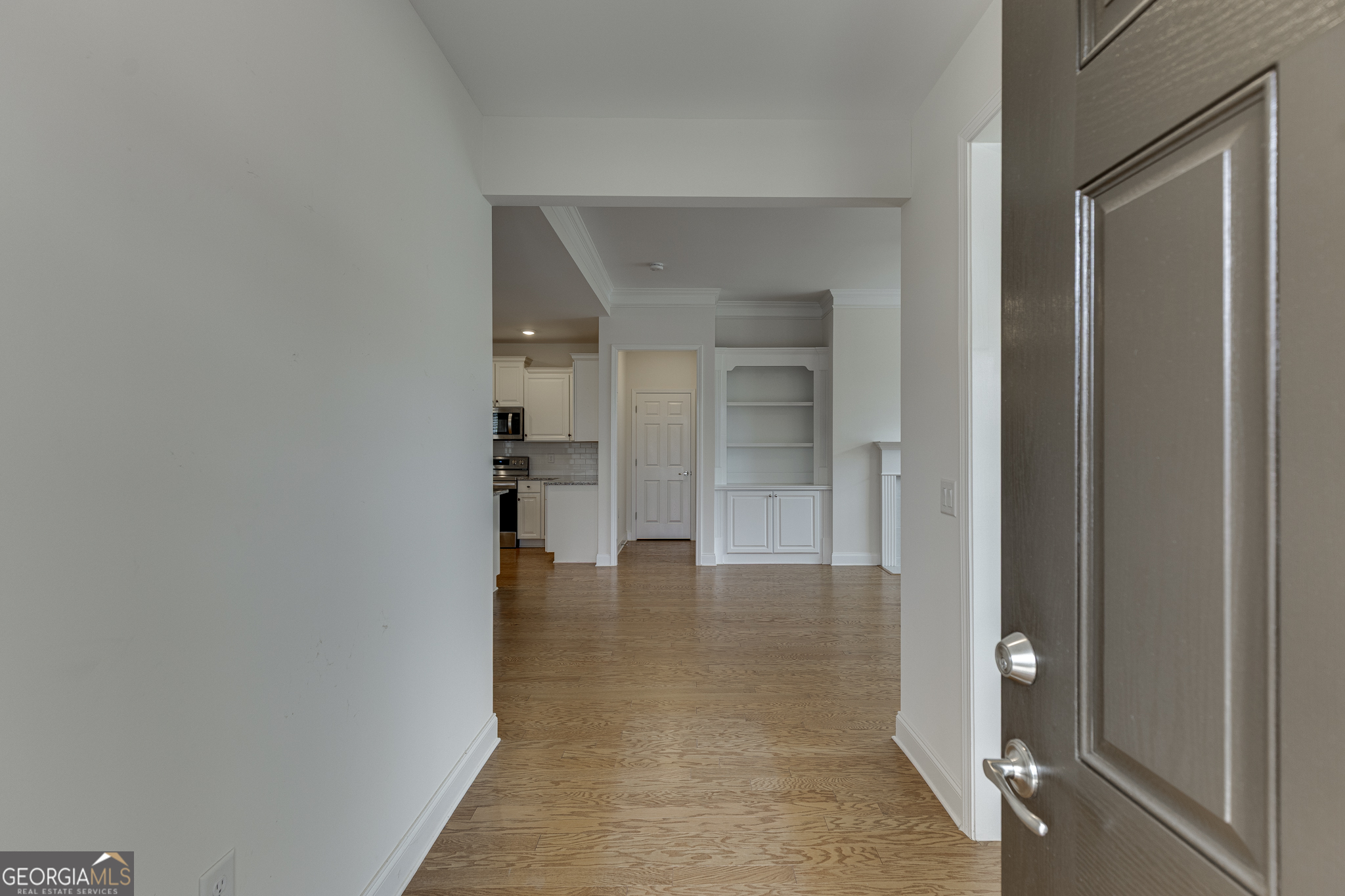 3765 Ridgehurst Drive Buford, GA 30518 - Photo 4 of 44 Welcoming entry foyer with hardwood floors and view into the main living areas.
